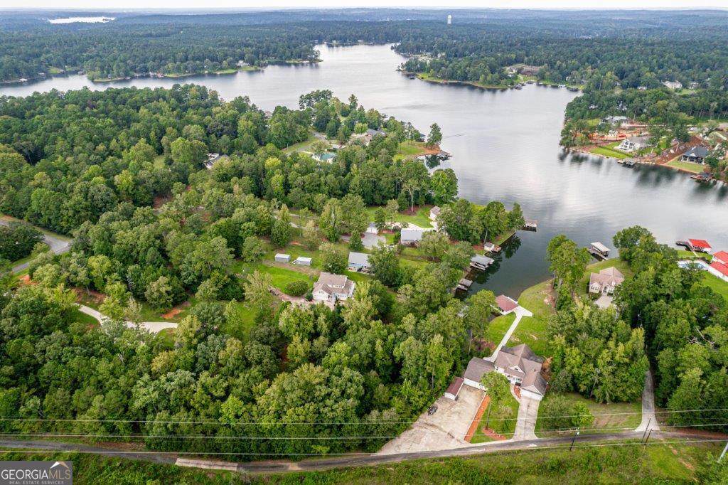281 Jule Ingram Road Milledgeville, GA 31061 - Photo 72 of 79 an aerial view of residential houses with outdoor space and lake view