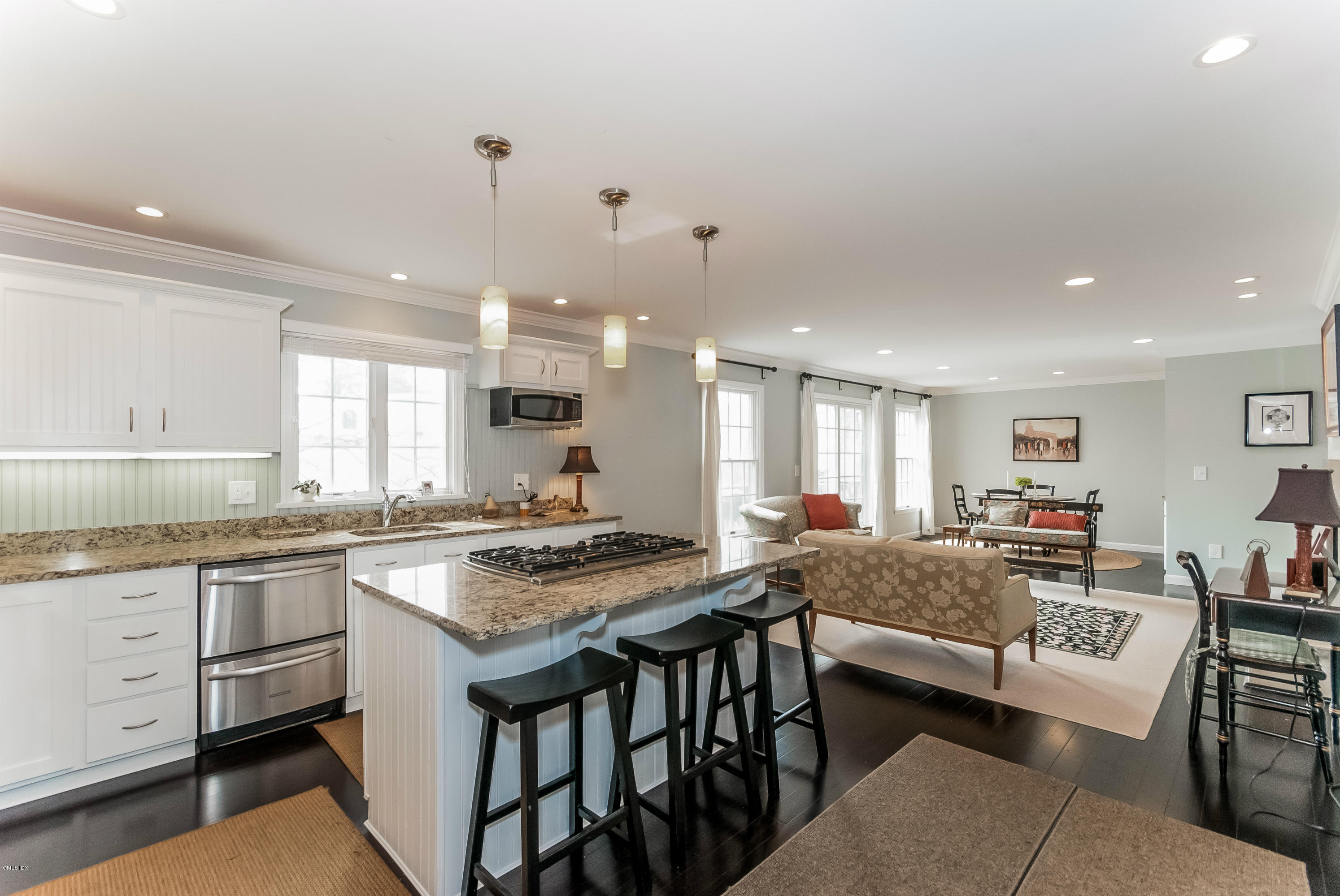 21 Roberta Lane Greenwich, CT 06830 - Photo 11 of 39 a kitchen with granite countertop a sink and white cabinets