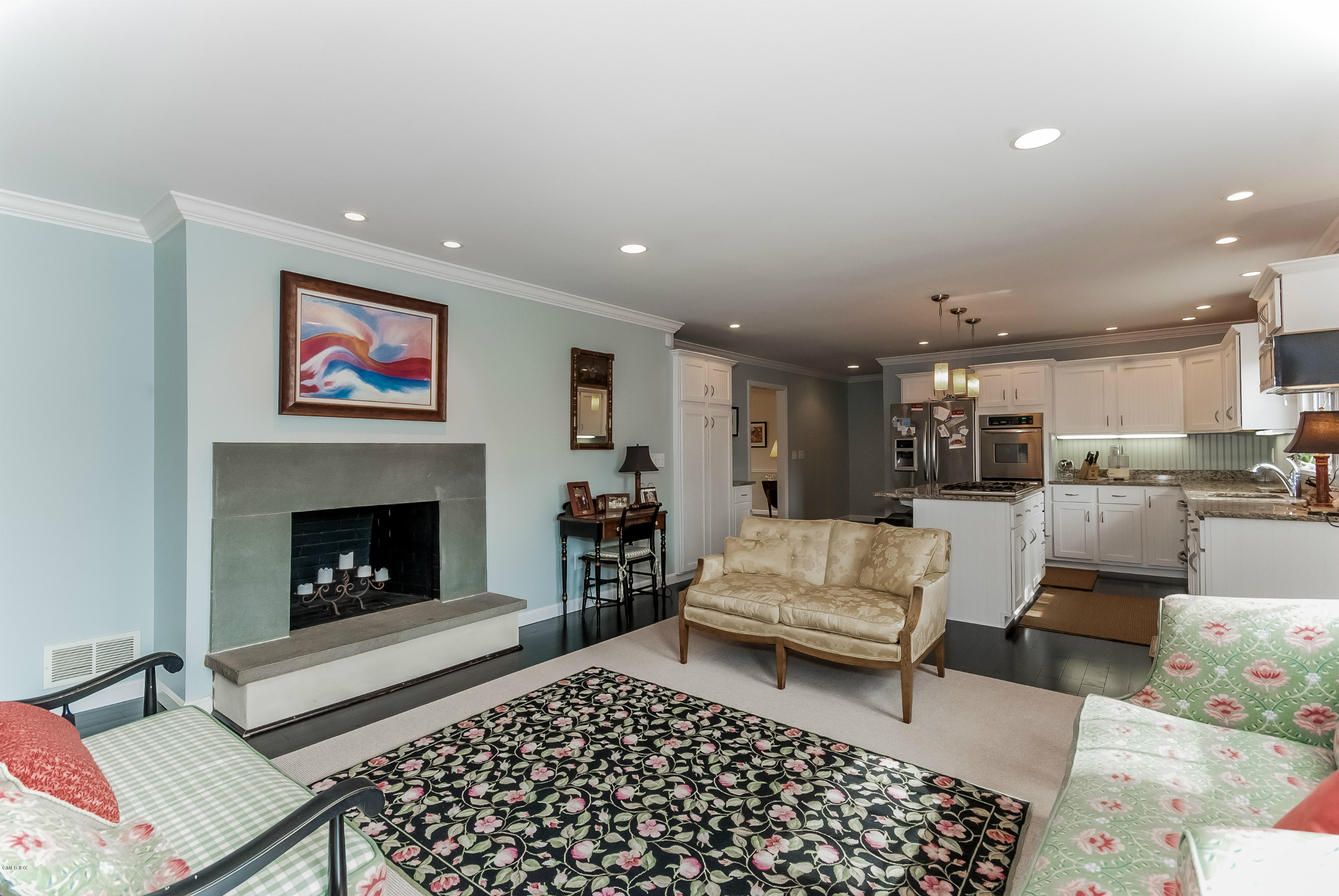 21 Roberta Lane Greenwich, CT 06830 - Photo 16 of 39 a living room with furniture and a fireplace