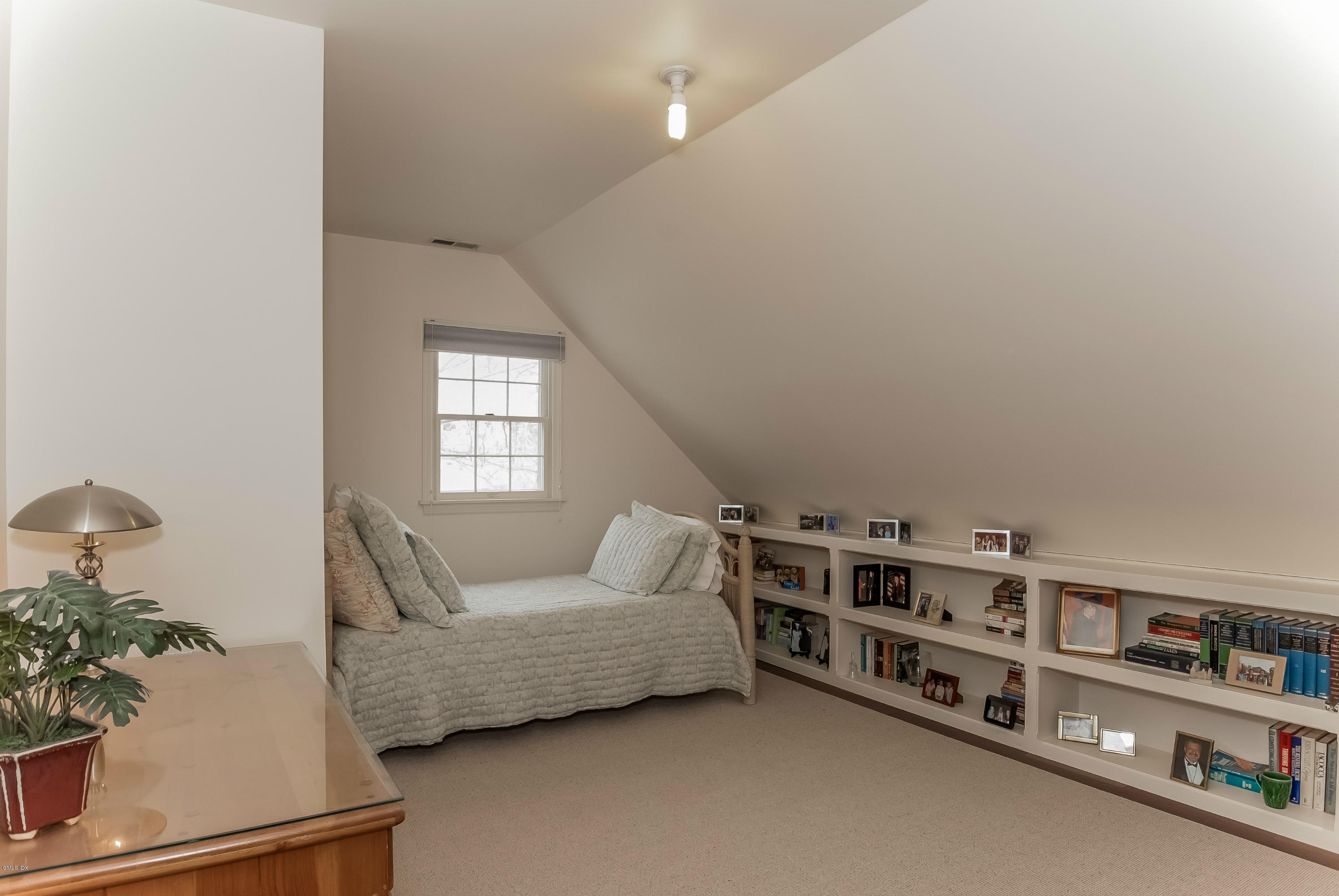 21 Roberta Lane Greenwich, CT 06830 - Photo 27 of 39 a living room with furniture cabinets and window