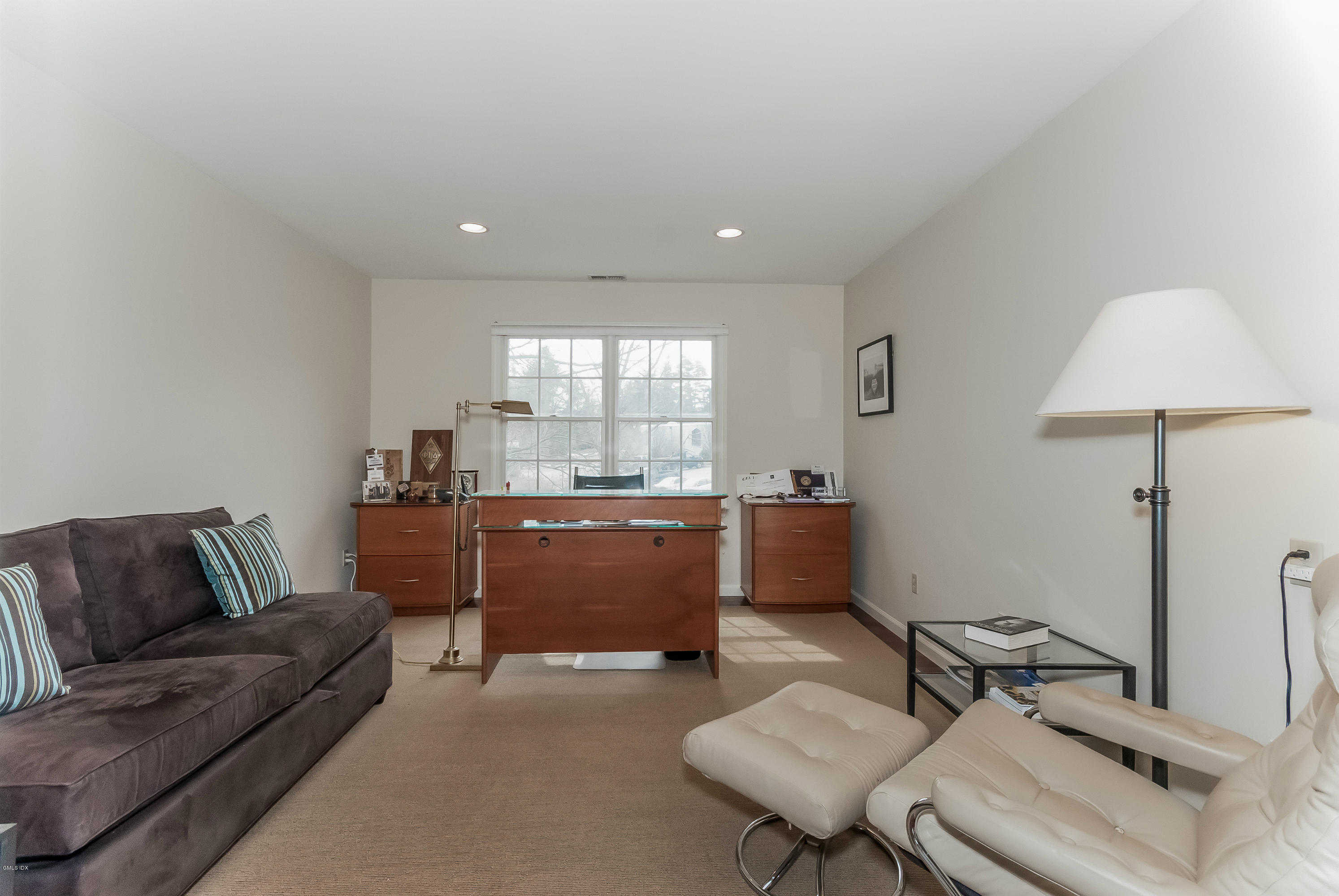 21 Roberta Lane Greenwich, CT 06830 - Photo 28 of 39 a living room with furniture and a wooden floor