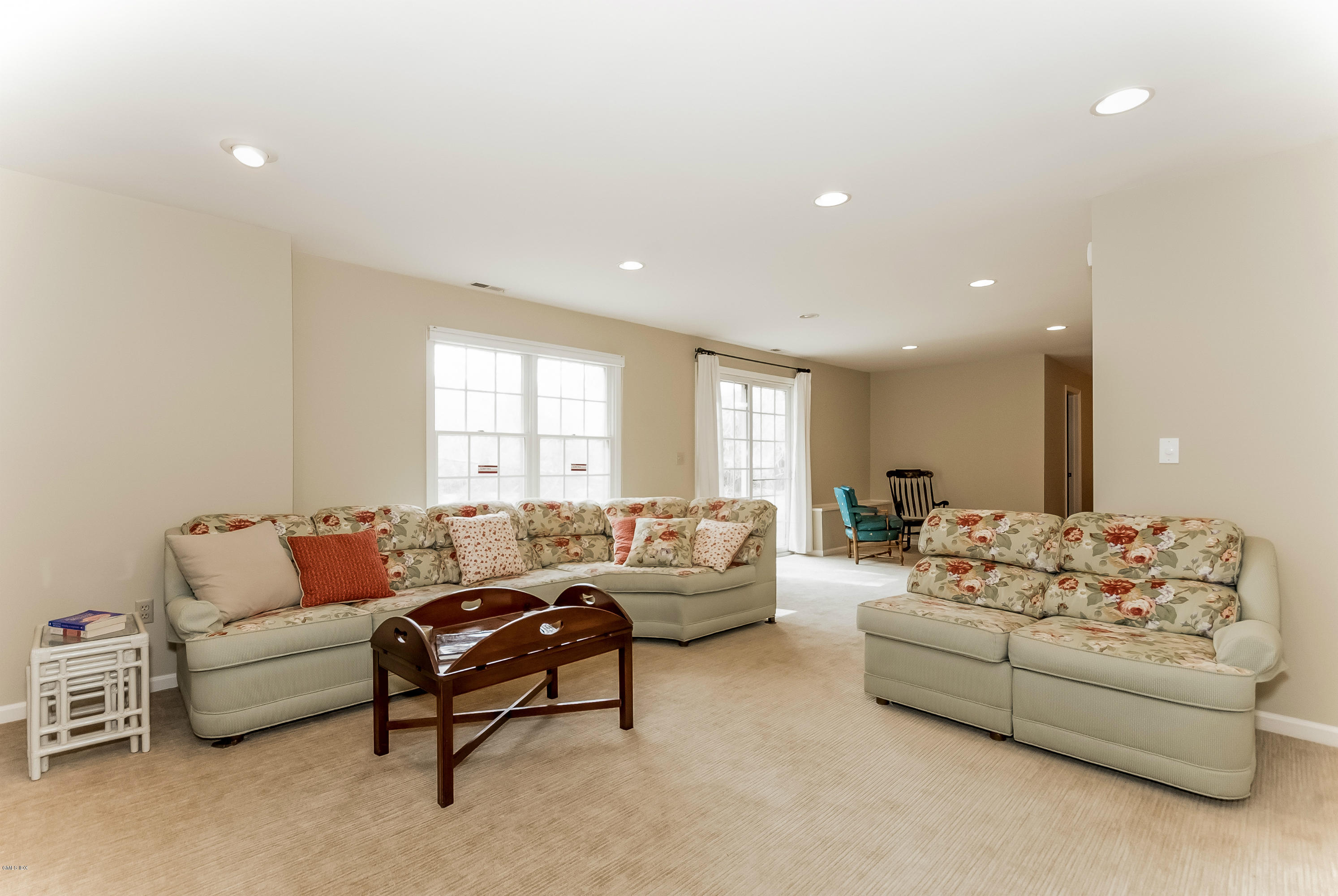 21 Roberta Lane Greenwich, CT 06830 - Photo 32 of 39 a living room with furniture and a large window