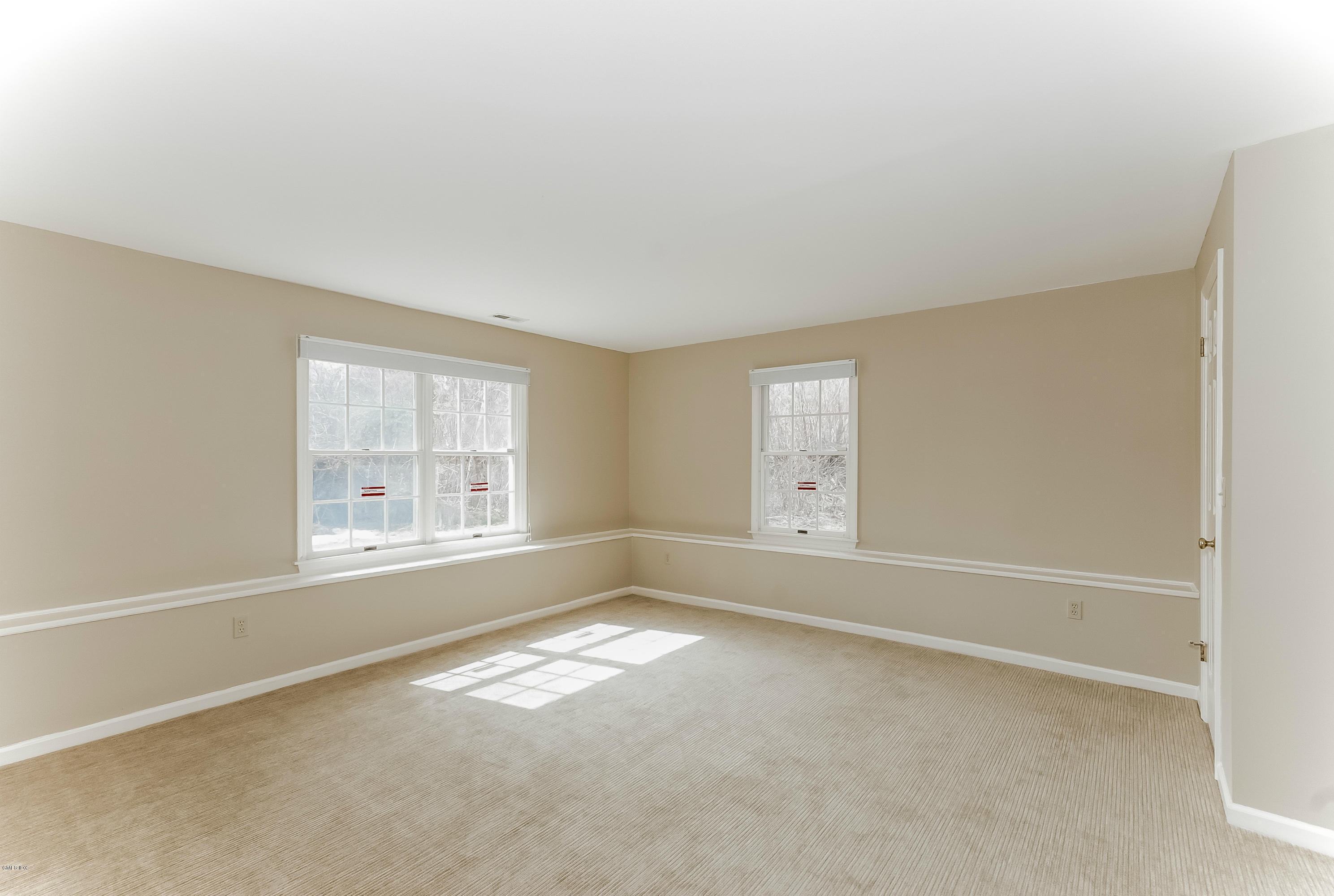 21 Roberta Lane Greenwich, CT 06830 - Photo 34 of 39 an empty room with windows
