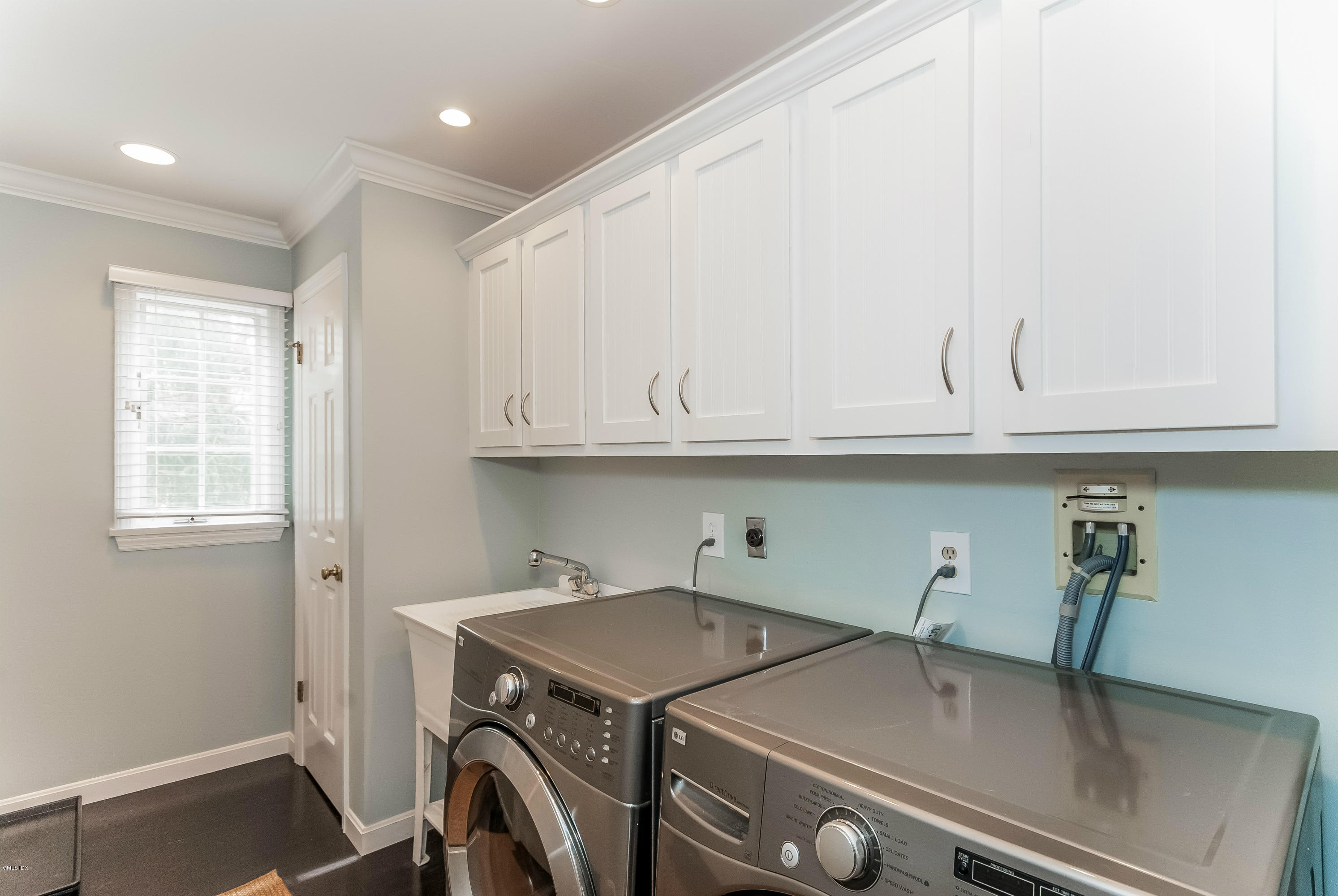 21 Roberta Lane Greenwich, CT 06830 - Photo 36 of 39 a utility room with dryer and washer