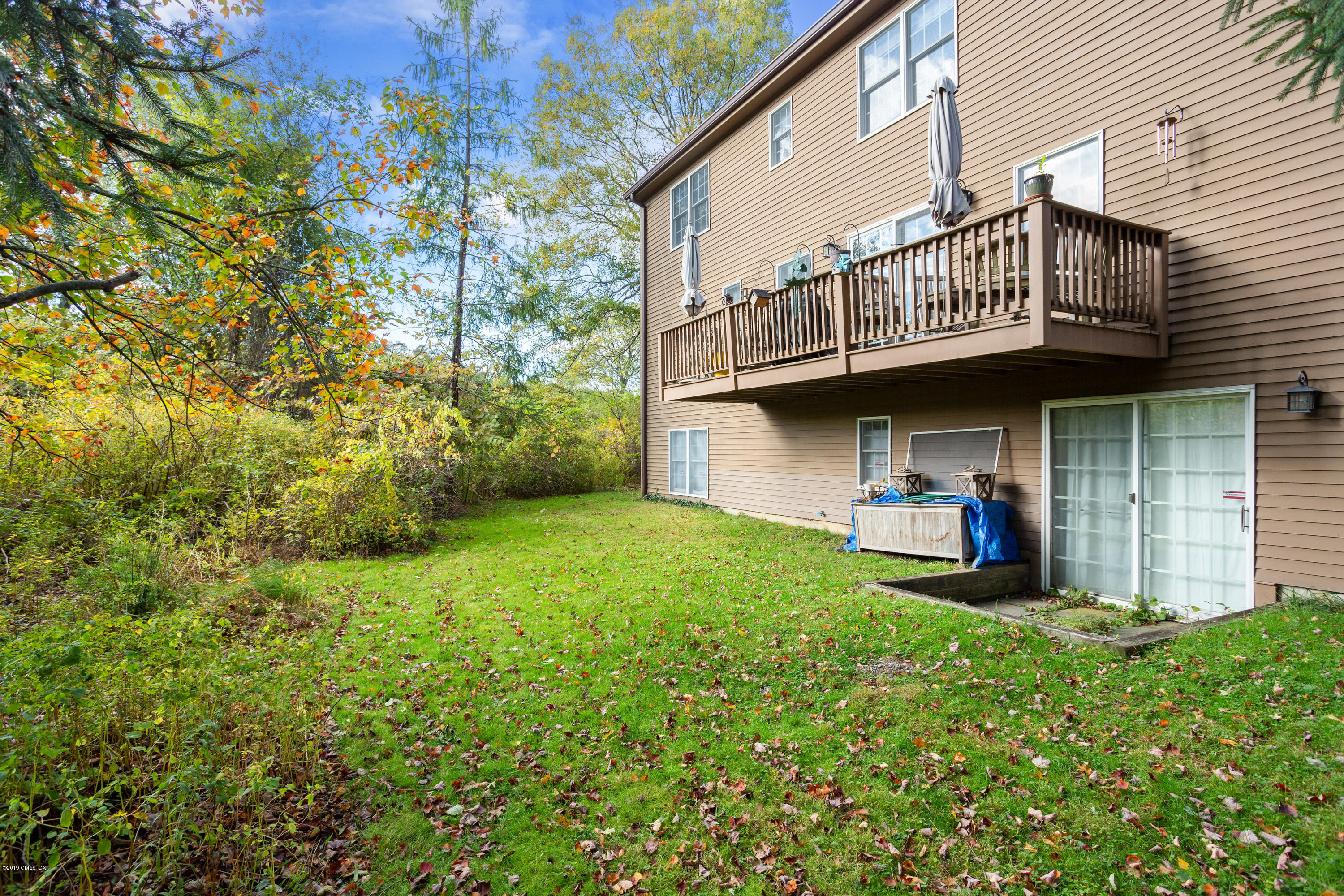 21 Roberta Lane Greenwich, CT 06830 - Photo 39 of 39 a view of a house with a yard and sitting area