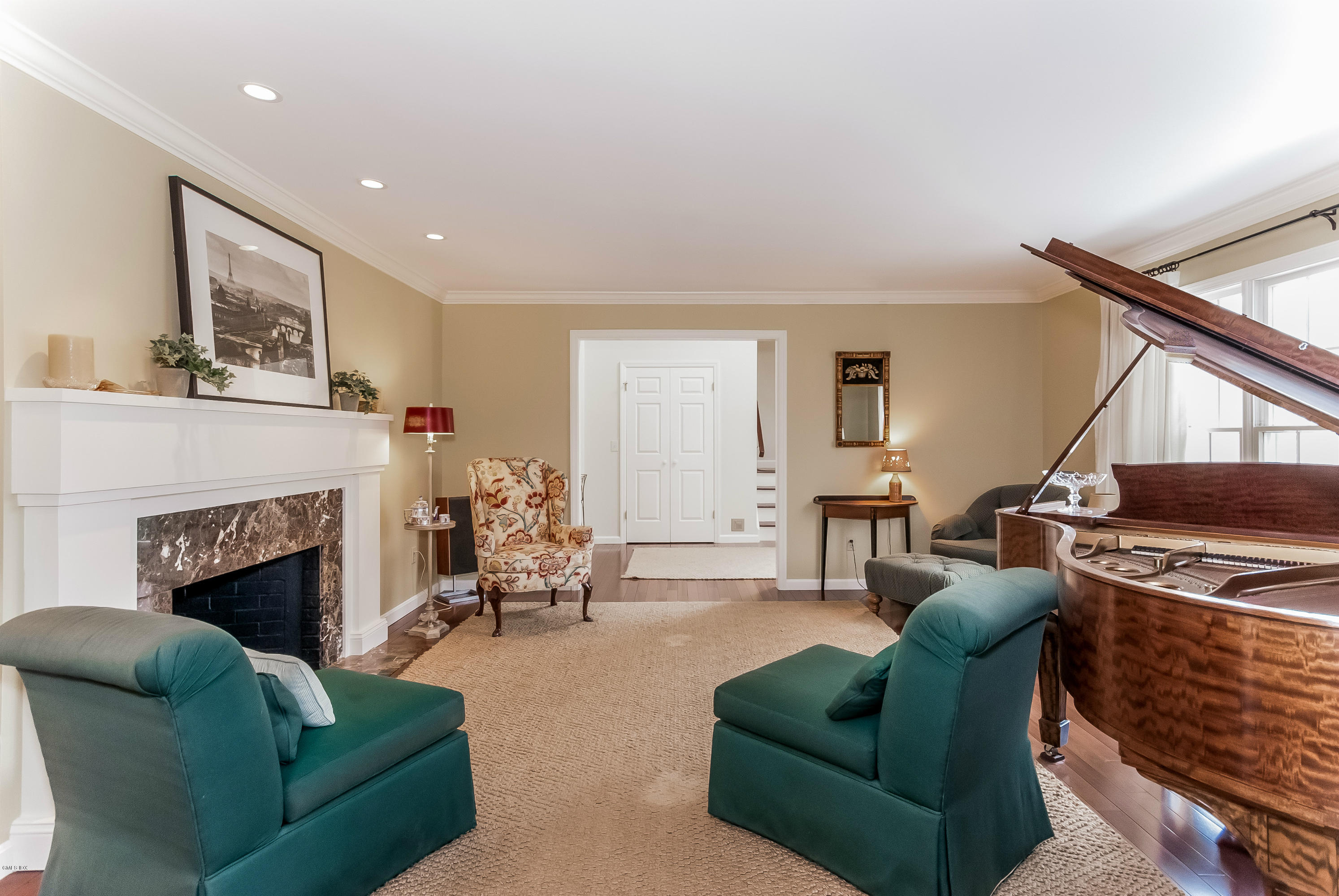 21 Roberta Lane Greenwich, CT 06830 - Photo 6 of 39 a living room with furniture and a fireplace