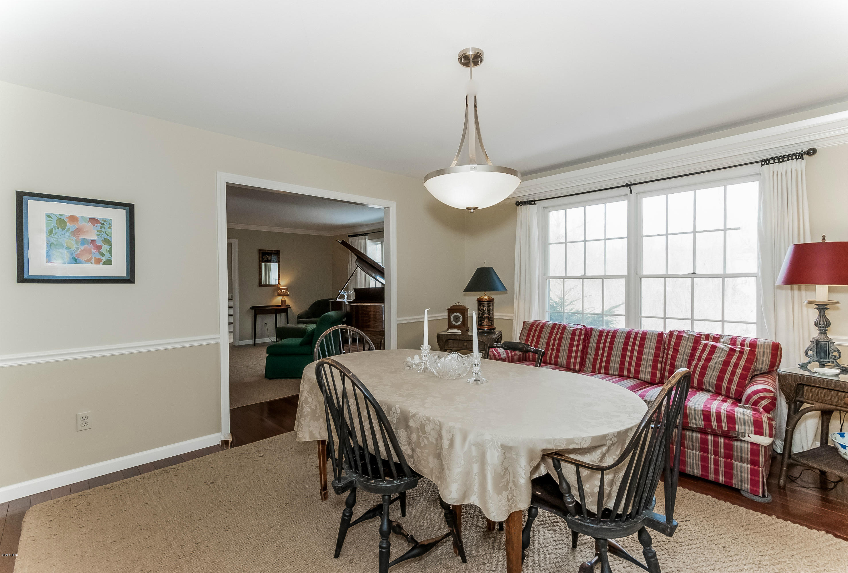 21 Roberta Lane Greenwich, CT 06830 - Photo 9 of 39 a view of a dining room with furniture window and wooden floor