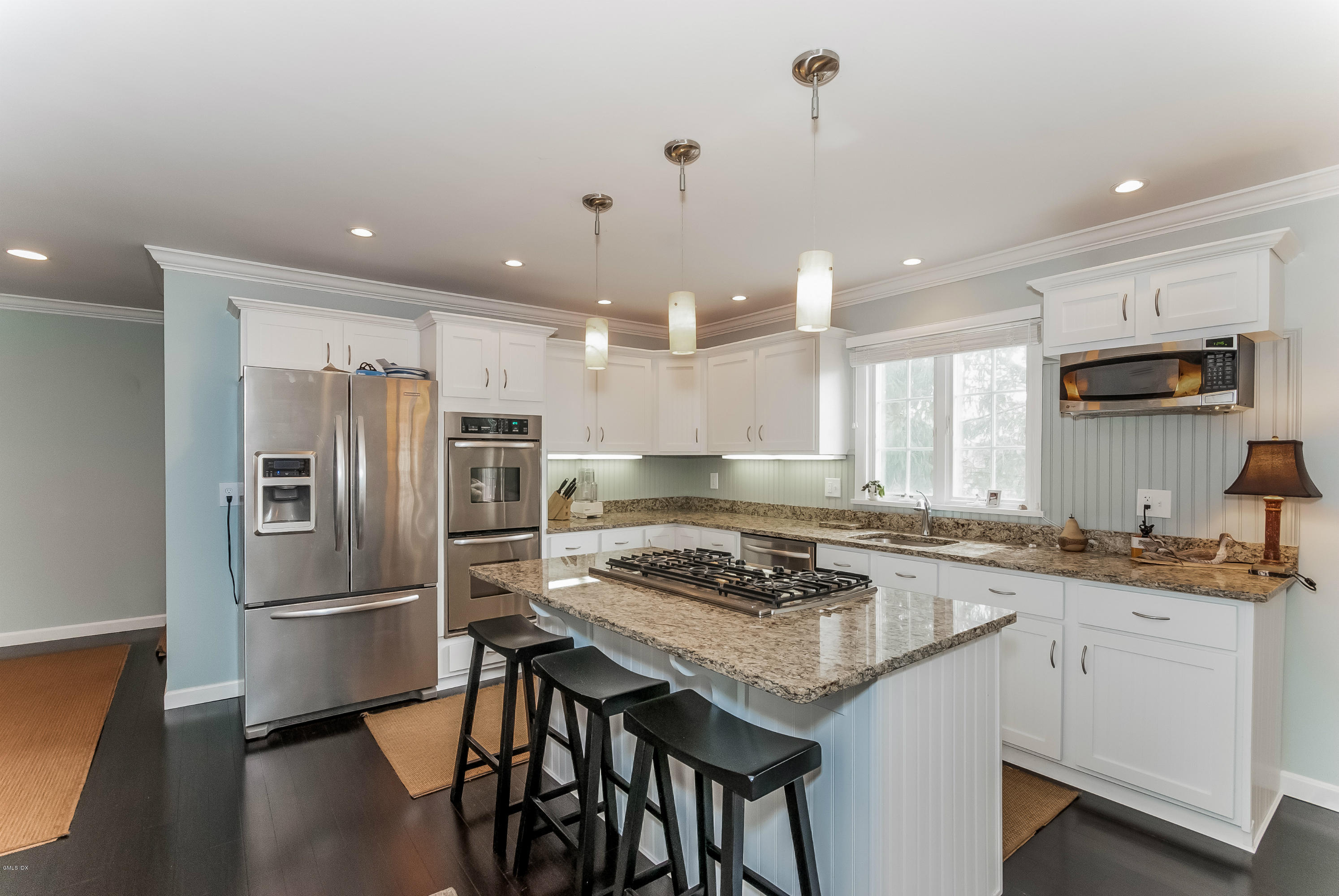 21 Roberta Lane Greenwich, CT 06830 - Photo 10 of 39 a kitchen with a stove a refrigerator and a sink