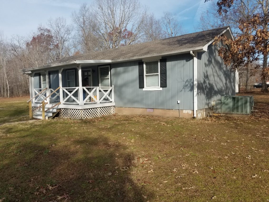 230 Maple Drive Beechgrove, TN 37018 - Photo 3 of 4 a house view with a backyard space