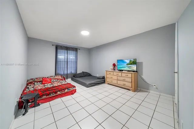 a bed room with a bed and a couch