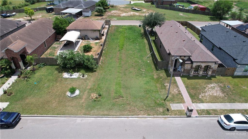 an aerial view of residential house with outdoor space