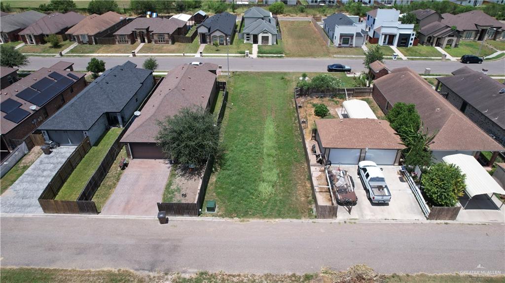 1728 Leann Rimes Road Edinburg, TX 78542 - Photo 2 of 8 an aerial view of multiple houses with yard