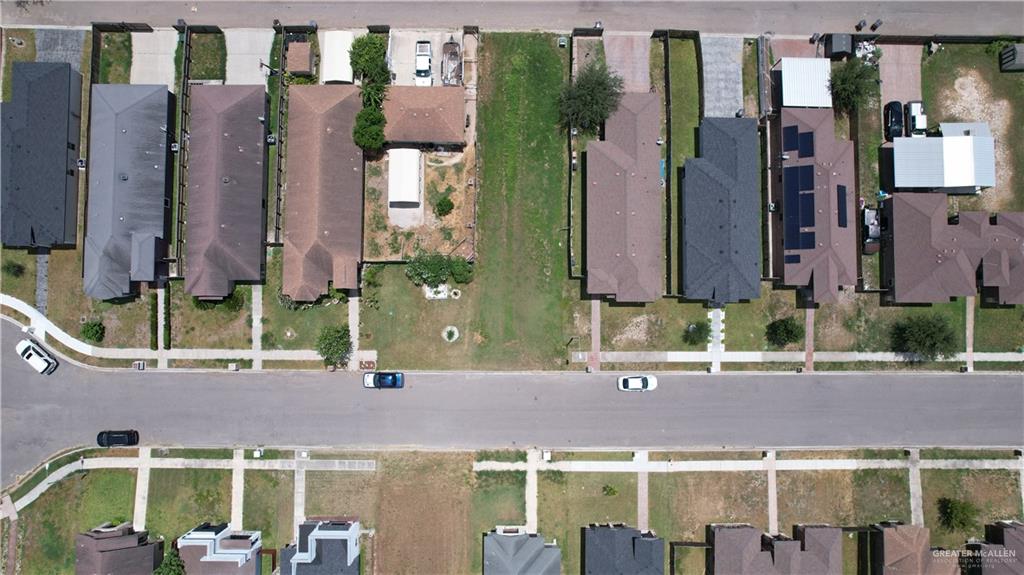 1728 Leann Rimes Road Edinburg, TX 78542 - Photo 5 of 8 a front view of a building with street