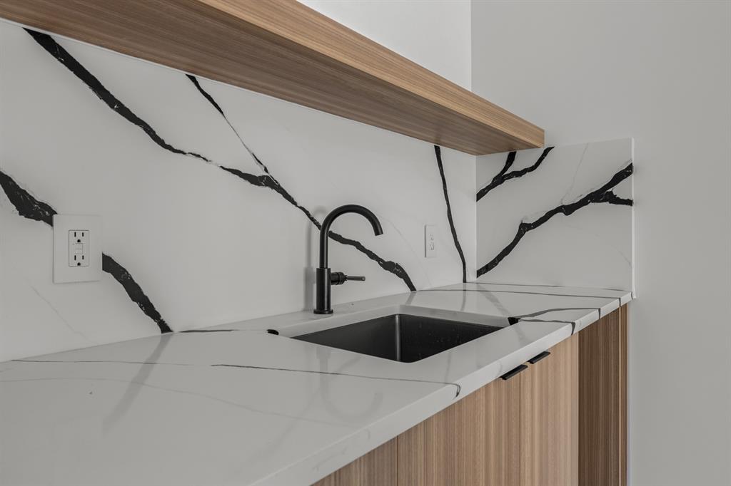 6231 McCommas Boulevard Dallas, TX 75214 - Photo 33 of 40 a close view of sink and tap