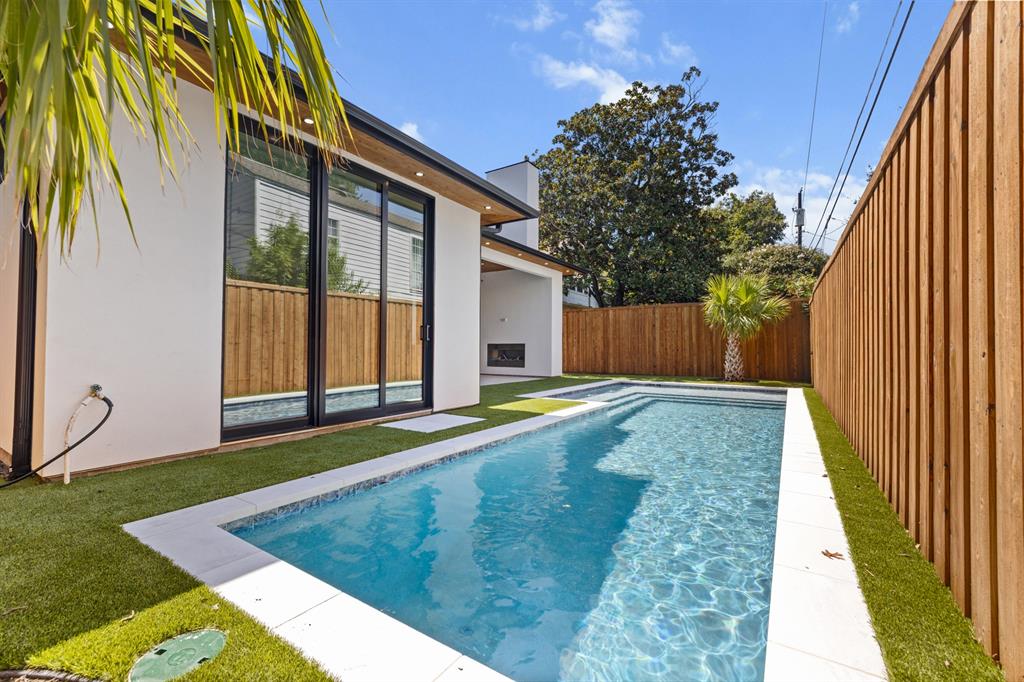6231 McCommas Boulevard Dallas, TX 75214 - Photo 5 of 40 a view of an house with backyard and tree