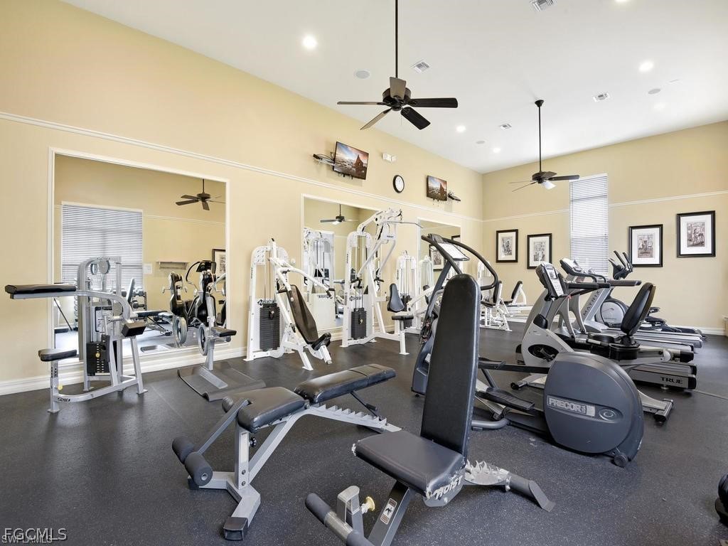 8554 Athena Court Lehigh Acres, FL 33971 - Photo 16 of 22 a view of a room with gym equipment