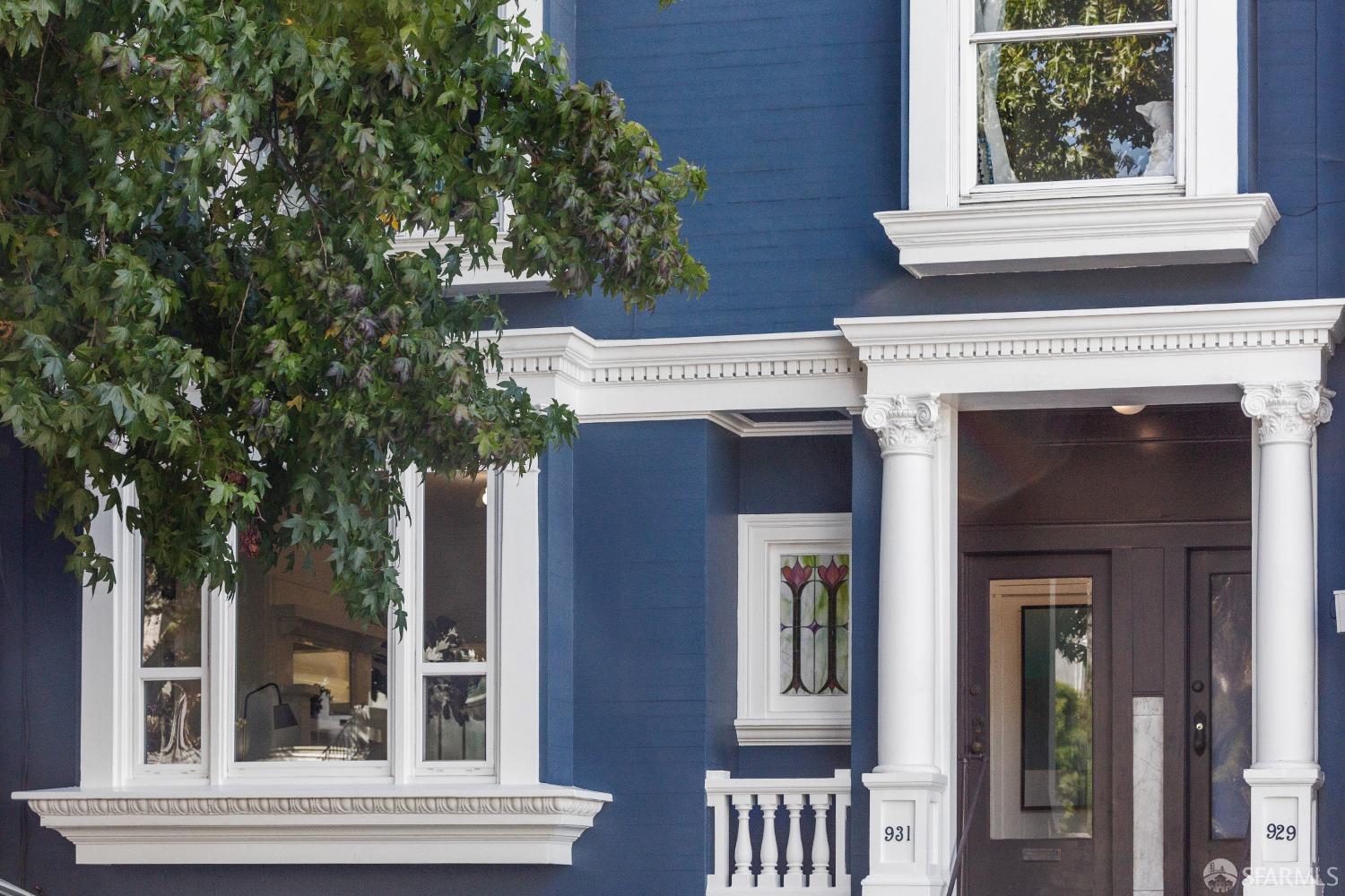 931 Clayton Street San Francisco, CA 94117 - Photo 2 of 28 front view of a house with a porch
