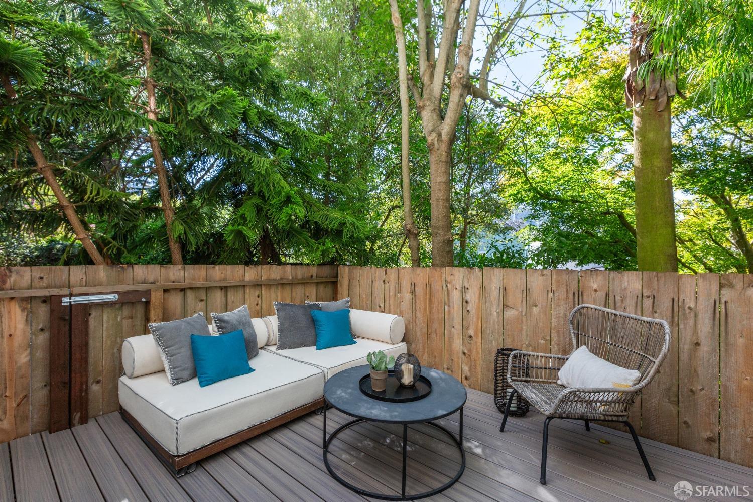 931 Clayton Street San Francisco, CA 94117 - Photo 27 of 28 a view of a couches in the deck under a large tree