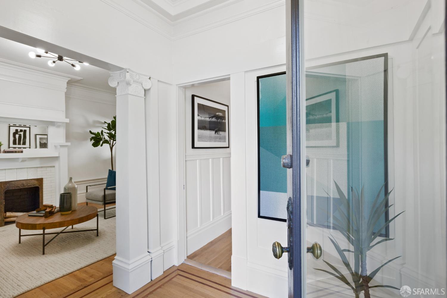931 Clayton Street San Francisco, CA 94117 - Photo 3 of 28 a living room with furniture and a fireplace
