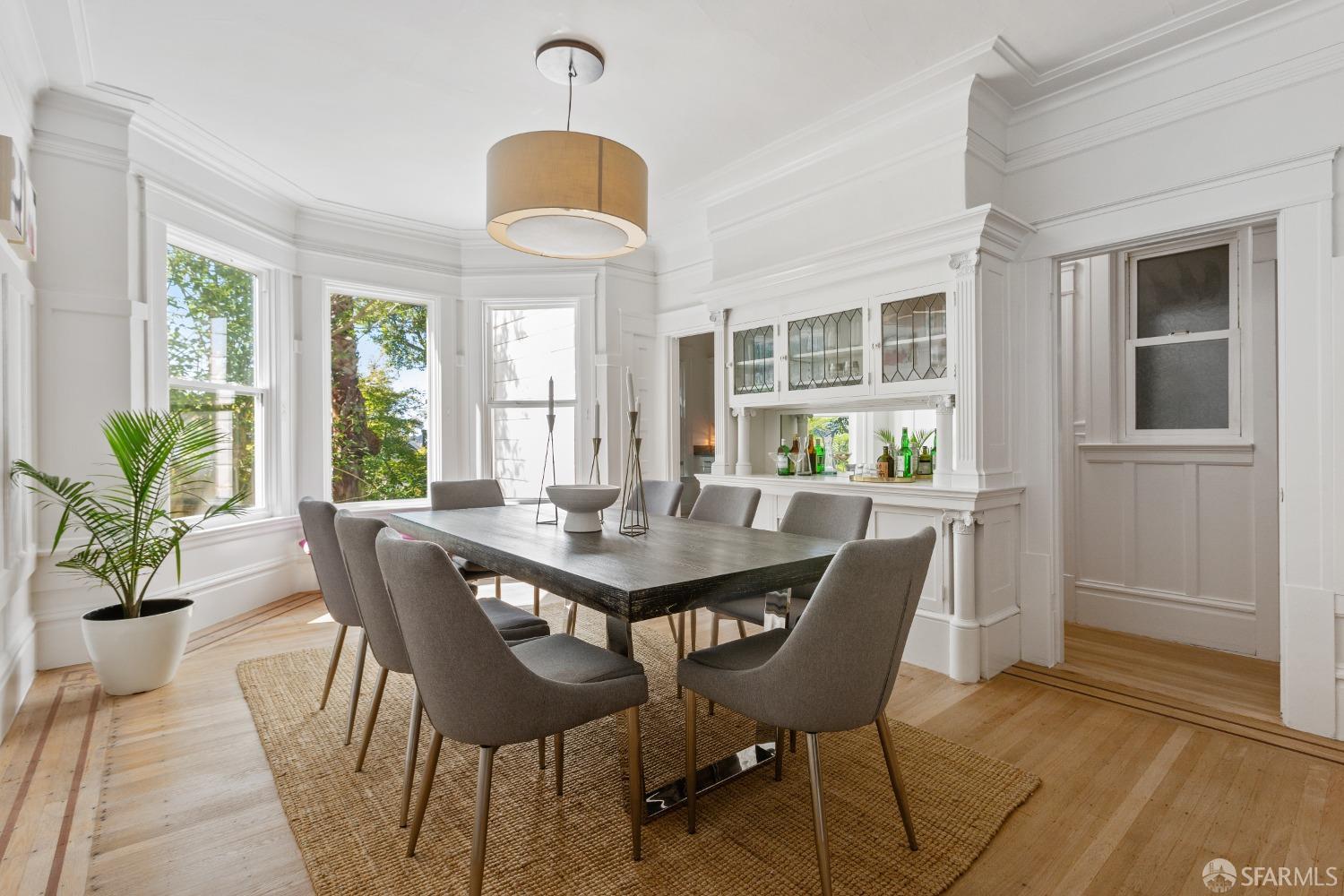 931 Clayton Street San Francisco, CA 94117 - Photo 10 of 28 a view of a dining room with furniture window and outside view