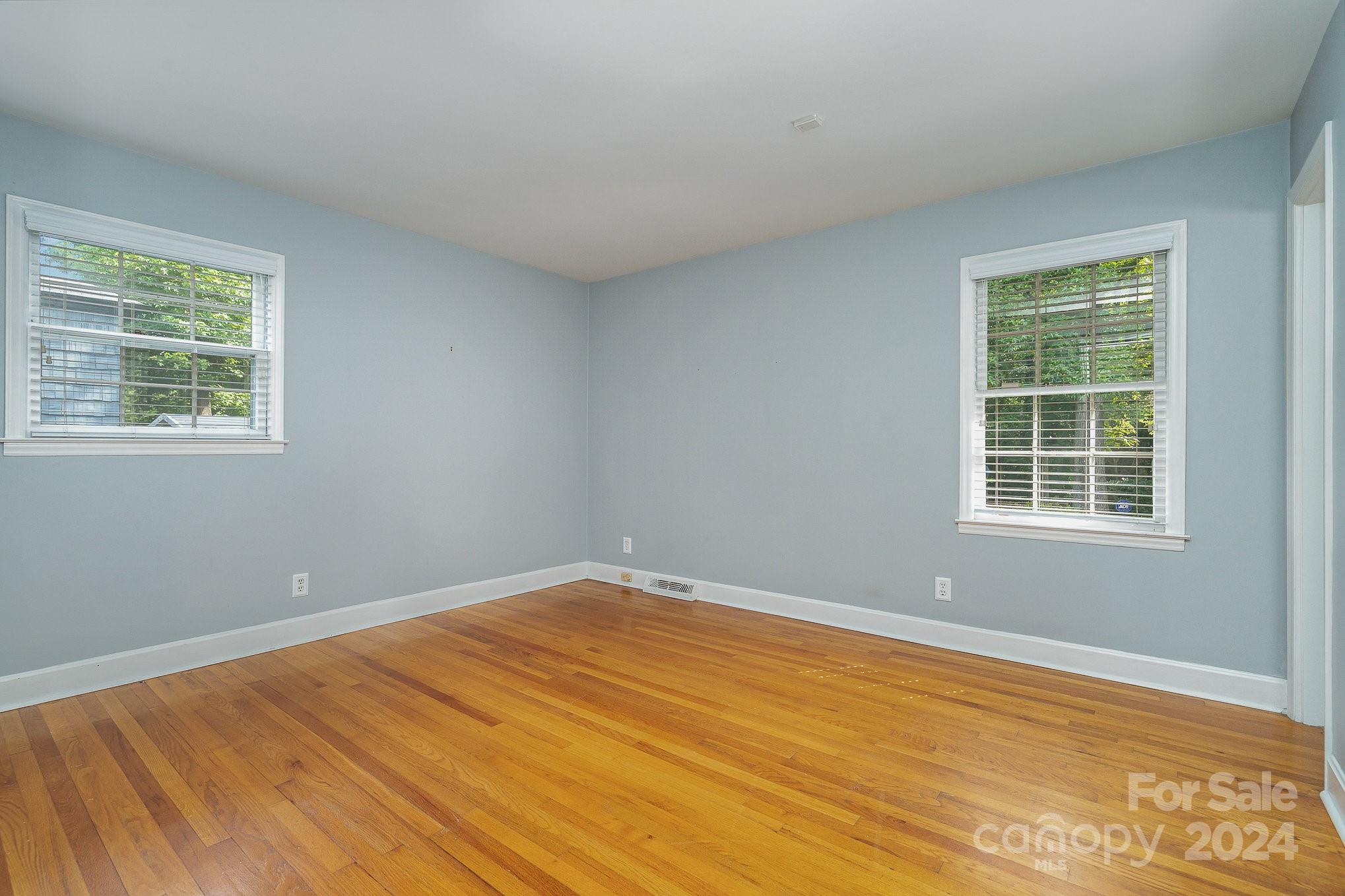 6529 Idlebrook Drive Charlotte, NC 28212 - Photo 12 of 28 a view of an empty room with a window