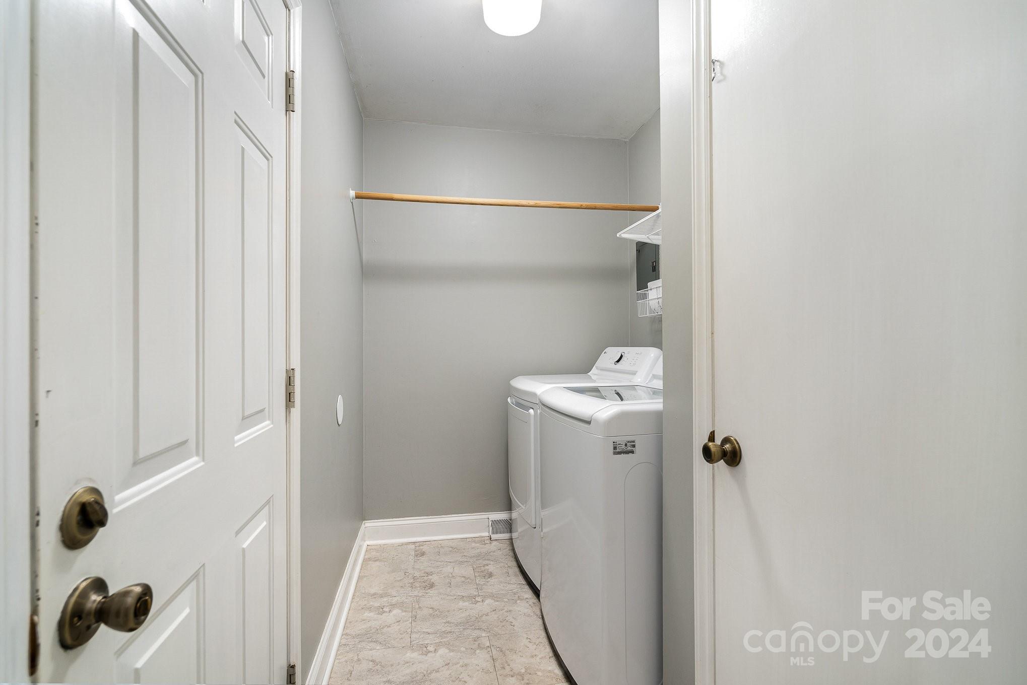 6529 Idlebrook Drive Charlotte, NC 28212 - Photo 19 of 28 a bathroom with a granite countertop shower