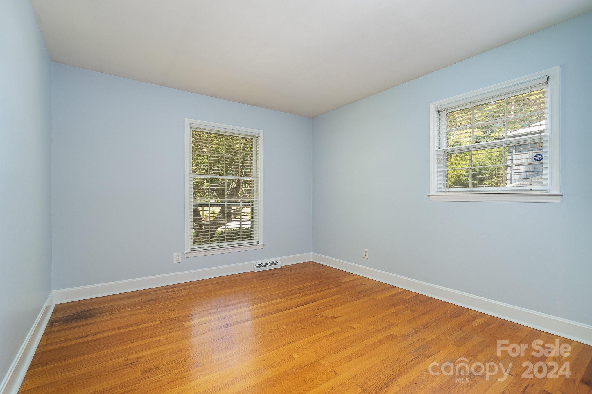 6529 Idlebrook Drive Charlotte, NC 28212 - Photo 23 of 28 a view of an empty room with a window
