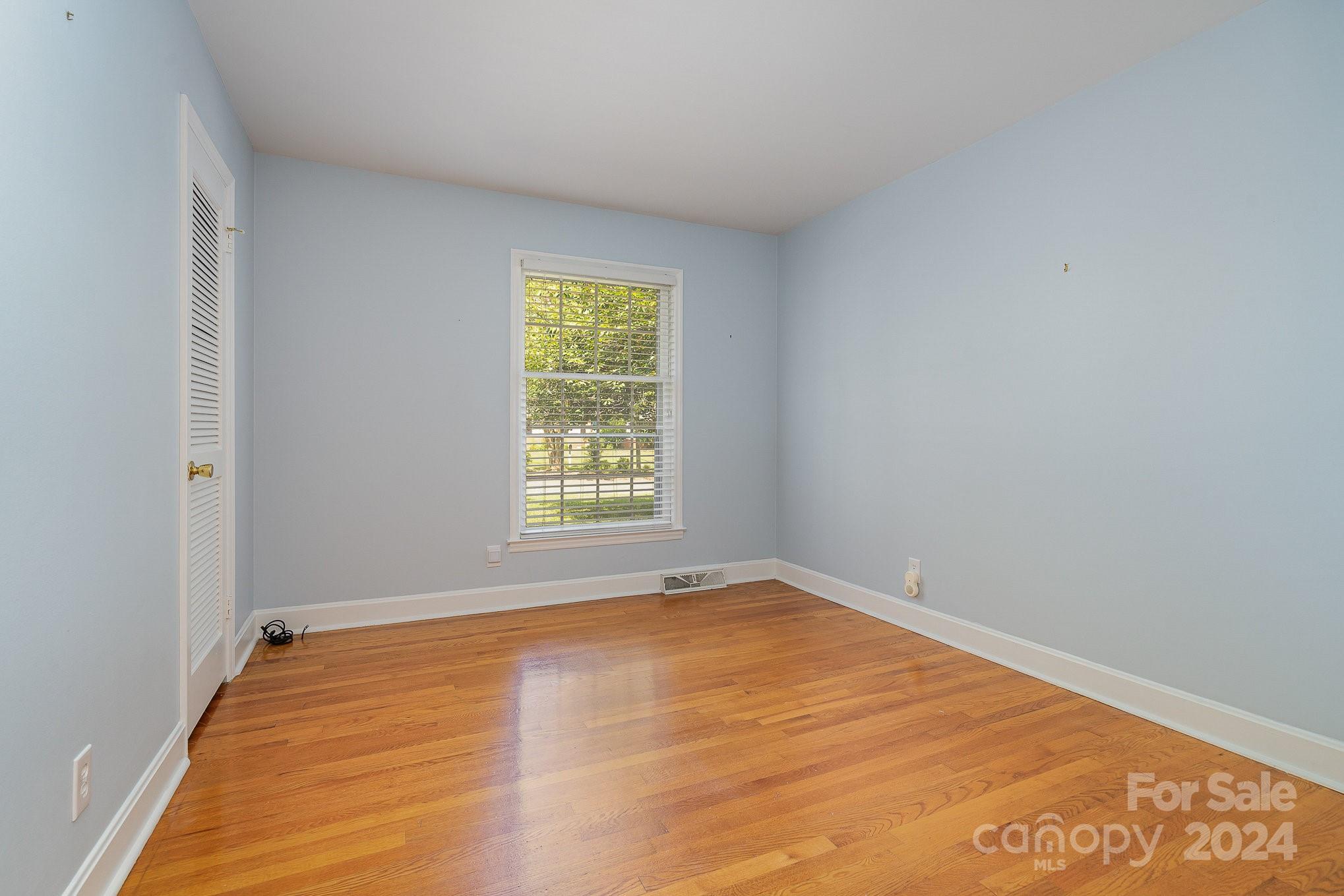 6529 Idlebrook Drive Charlotte, NC 28212 - Photo 26 of 28 a view of an empty room with a window