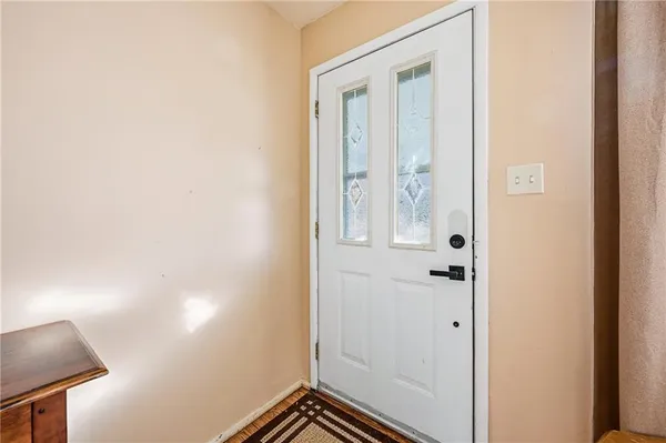 a view of a bathroom with mirror