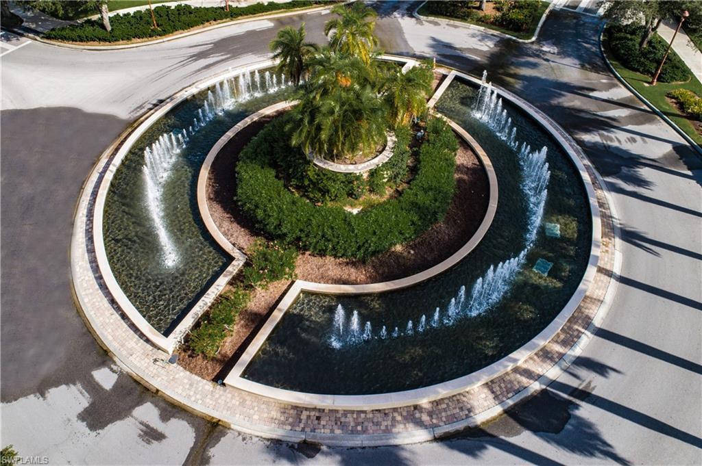 9572 Trevi Court, Unit 5015 Naples, FL 34113 - Photo 26 of 39 an aerial view of a house with outdoor space