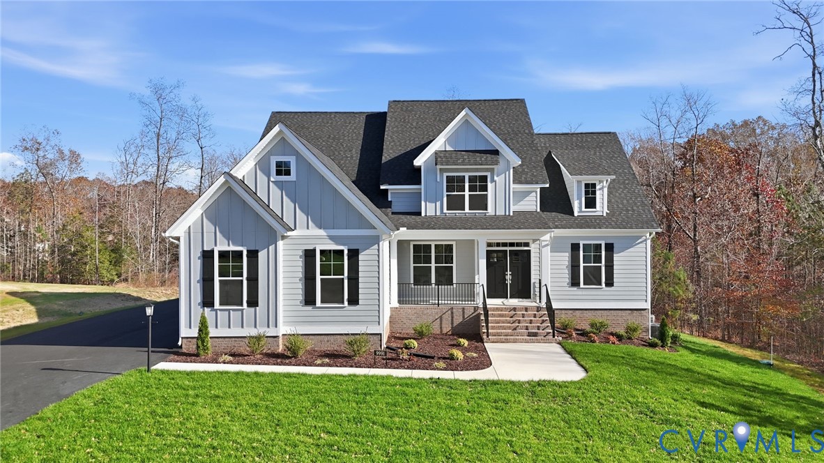 9991 Boschen Wds Place Chesterfield, VA 23832 - Photo 1 of 38 front view of a house with a yard