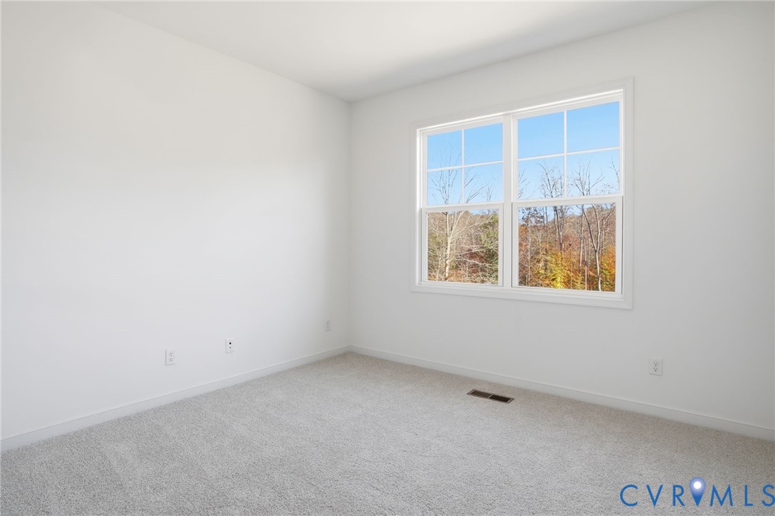 9991 Boschen Wds Place Chesterfield, VA 23832 - Photo 17 of 38 an empty room with windows