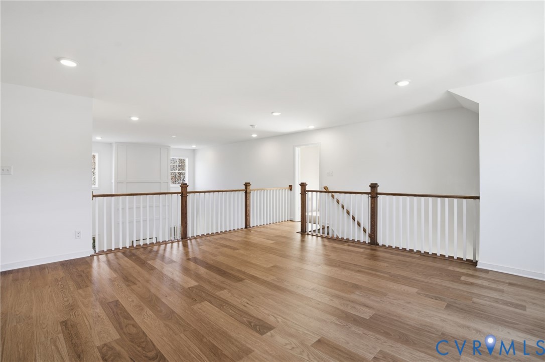 9991 Boschen Wds Place Chesterfield, VA 23832 - Photo 20 of 38 a view of an empty room with wooden floor and fence