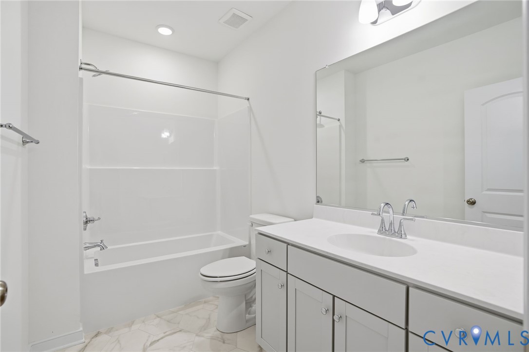 9991 Boschen Wds Place Chesterfield, VA 23832 - Photo 29 of 38 a bathroom with a sink a toilet and shower