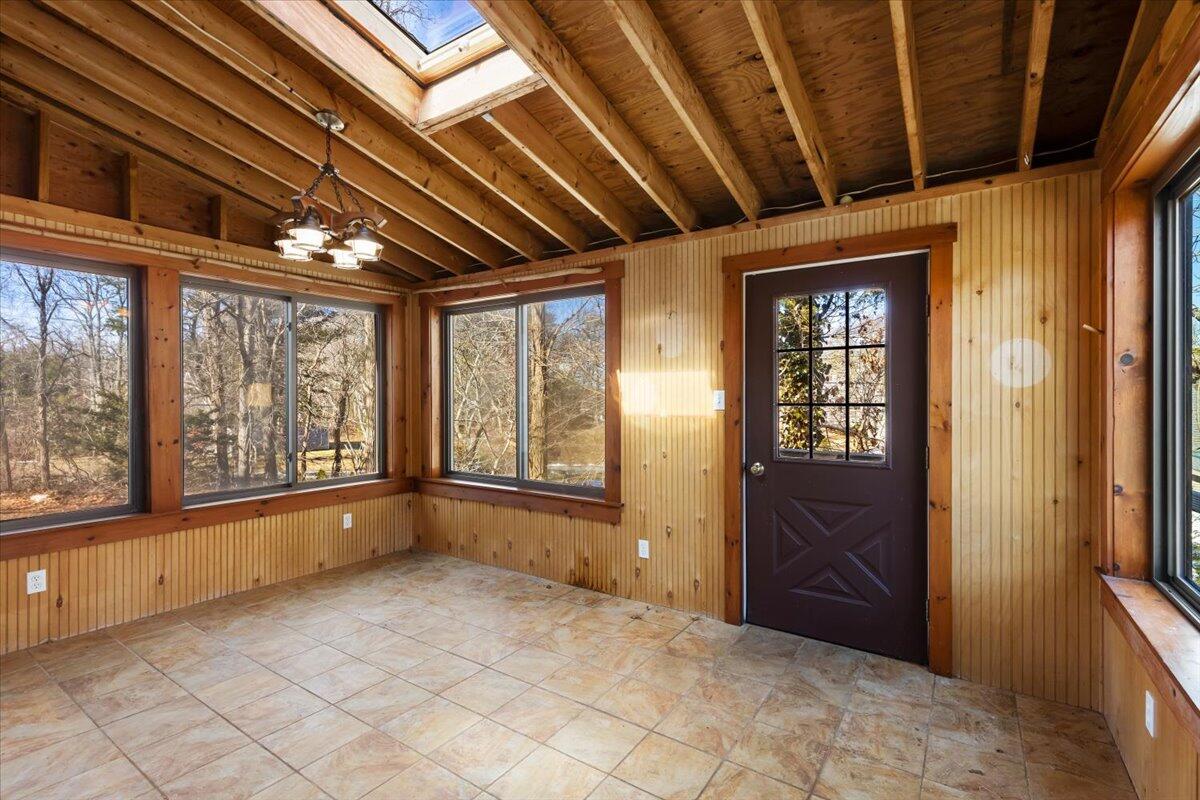 1094 County Road Cataumet, MA 02534 - Photo 19 of 42 a view of an empty room with a window