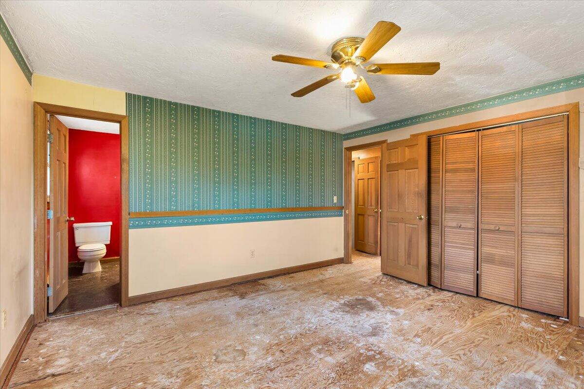 1094 County Road Cataumet, MA 02534 - Photo 22 of 42 a view of an empty room with a window