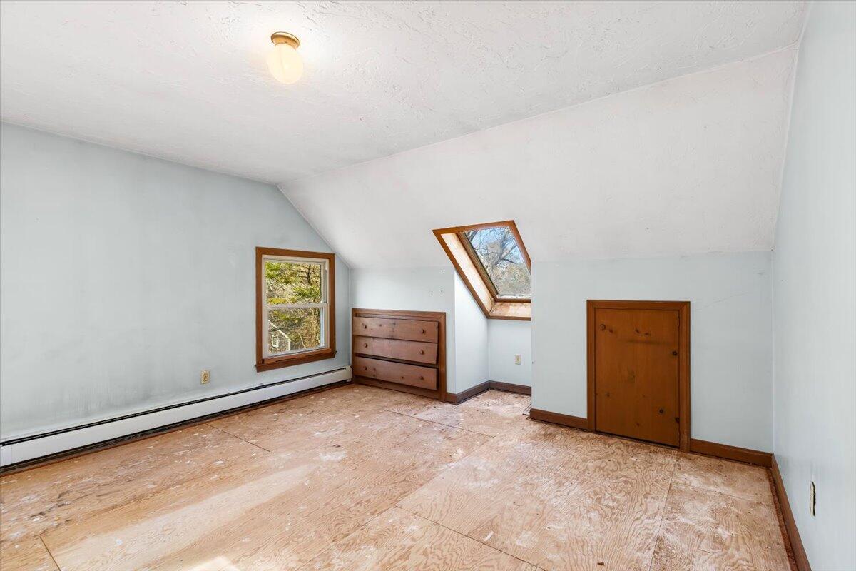 1094 County Road Cataumet, MA 02534 - Photo 25 of 42 a view of an empty room with a window