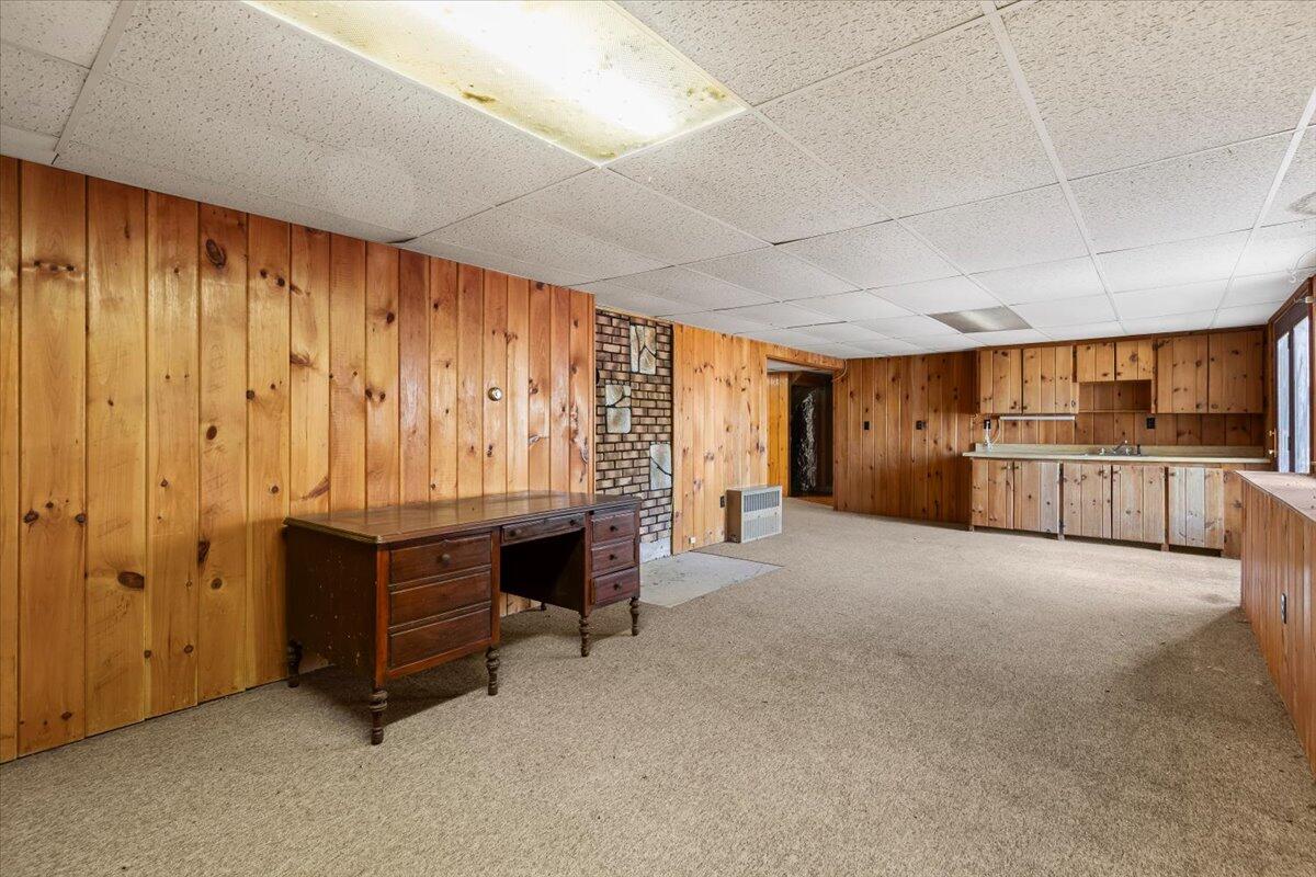 1094 County Road Cataumet, MA 02534 - Photo 32 of 42 a large bed room with a bed and furniture