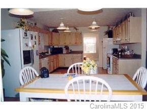 201 Sean Way Hendersonville, NC 28792 - Photo 4 of 8 a view of kitchen and dining area with chandelier