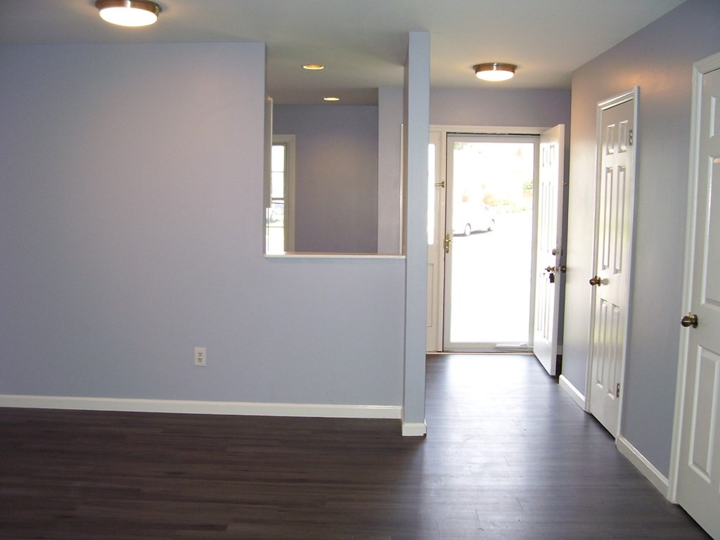 4 Balcomb Street, Unit 4 Salem, MA 01970 - Photo 17 of 38 a view of entryway with wooden floor