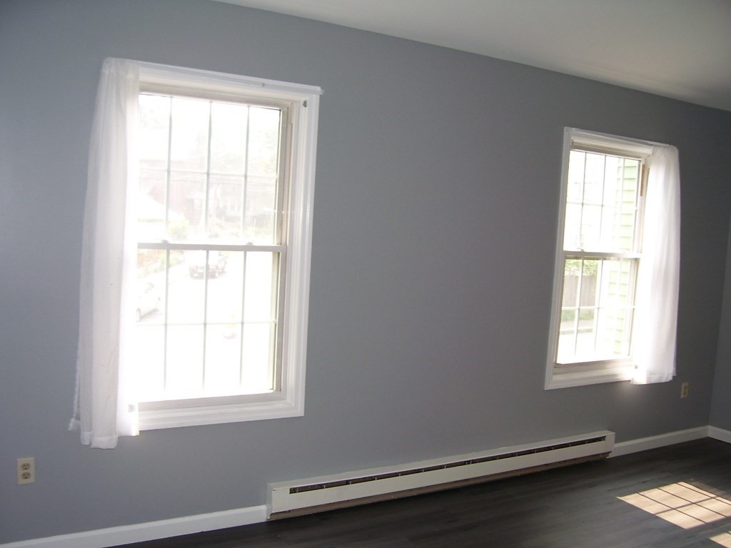 4 Balcomb Street, Unit 4 Salem, MA 01970 - Photo 21 of 38 an empty room with a window