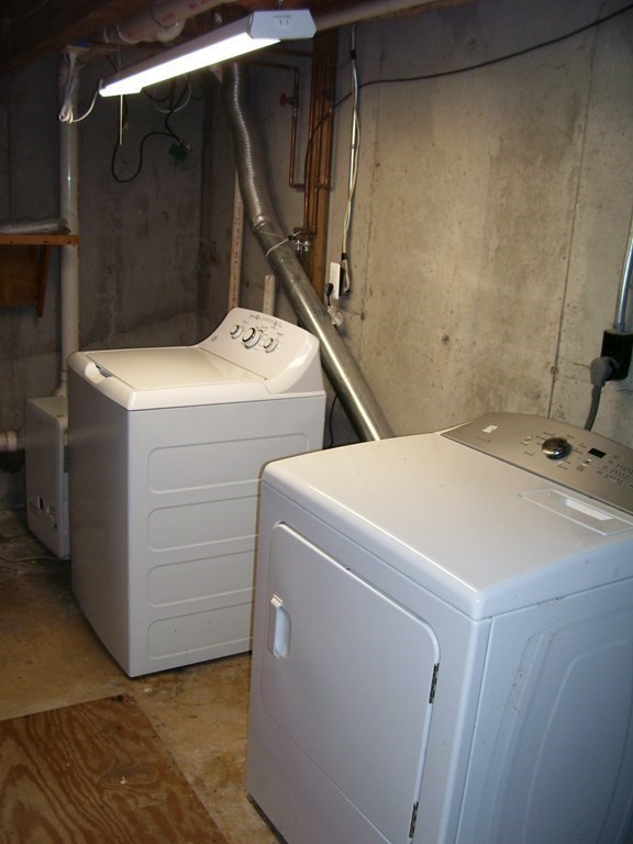 4 Balcomb Street, Unit 4 Salem, MA 01970 - Photo 33 of 38 a utility room with dryer and washer