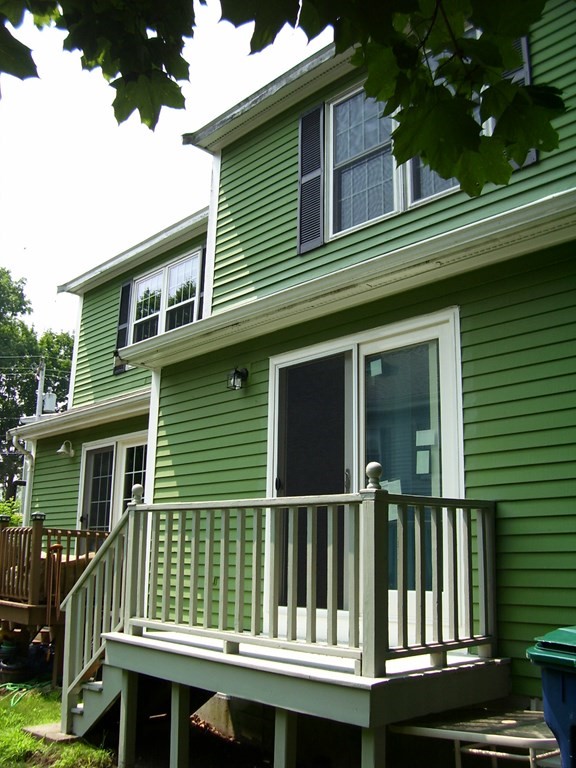 4 Balcomb Street, Unit 4 Salem, MA 01970 - Photo 5 of 38 a house view with a garden space