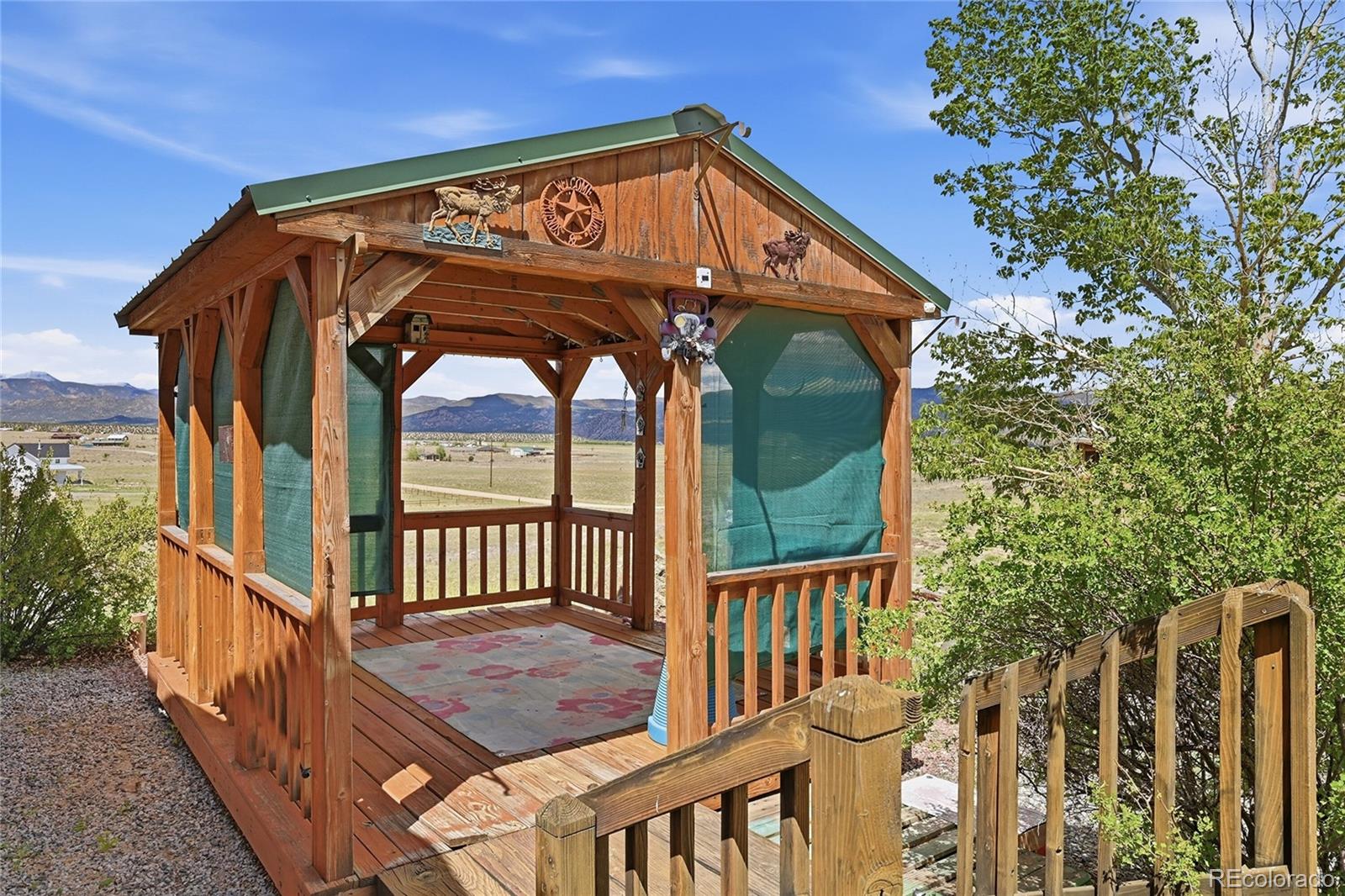 20300 Old Ranch Loop Nathrop, CO 81236 - Photo 3 of 35 a view of a small yard and deck