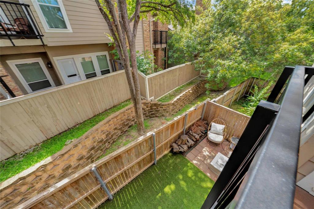 8518 Coppertowne Lane Dallas, TX 75243 - Photo 25 of 32 a view of an house with backyard and deck