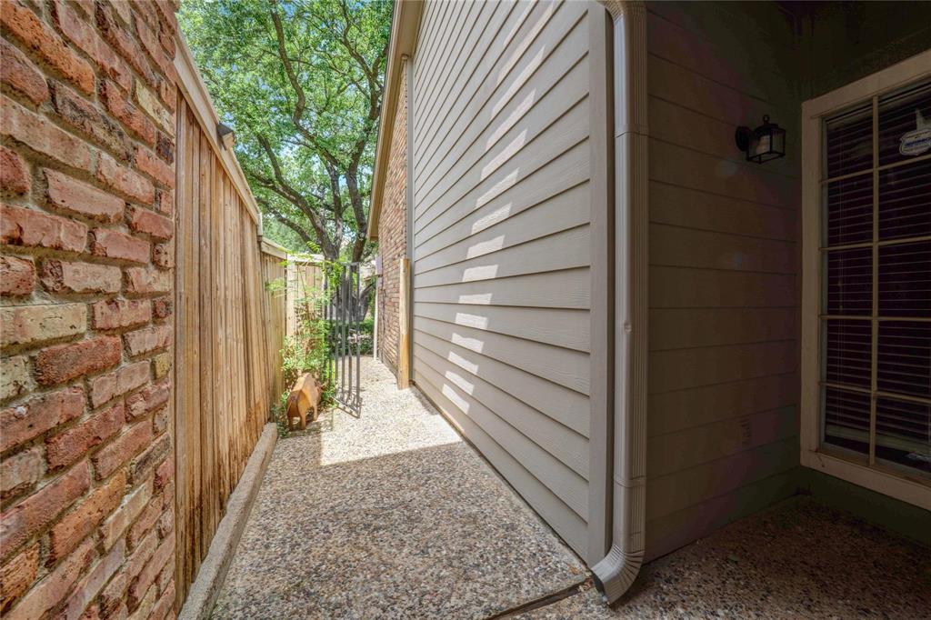 8518 Coppertowne Lane Dallas, TX 75243 - Photo 29 of 32 a view of a corridor