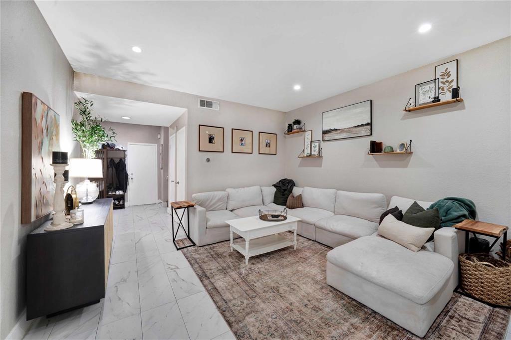 8518 Coppertowne Lane Dallas, TX 75243 - Photo 3 of 32 a living room with furniture and a couch