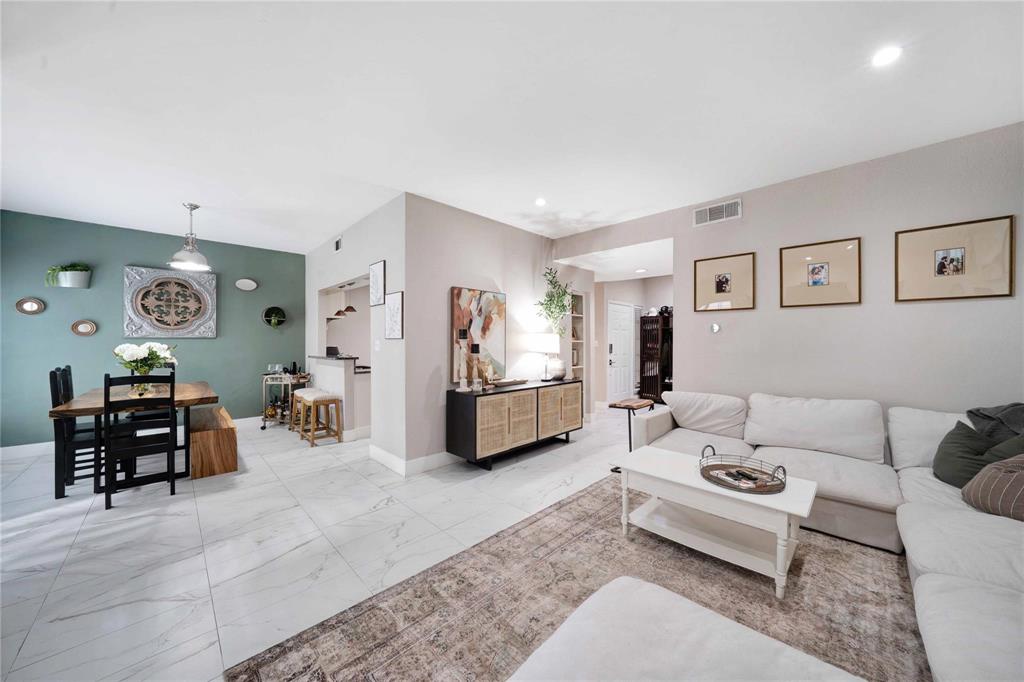 8518 Coppertowne Lane Dallas, TX 75243 - Photo 5 of 32 a living room with furniture and a couch