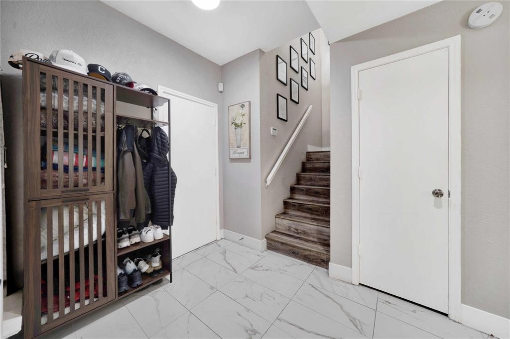 8518 Coppertowne Lane Dallas, TX 75243 - Photo 7 of 32 a view of a entryway with stairs