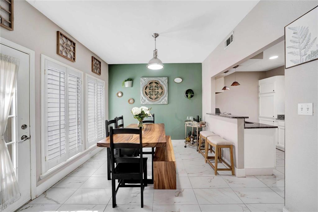 8518 Coppertowne Lane Dallas, TX 75243 - Photo 10 of 32 a view of a livingroom with furniture and a ceiling fan